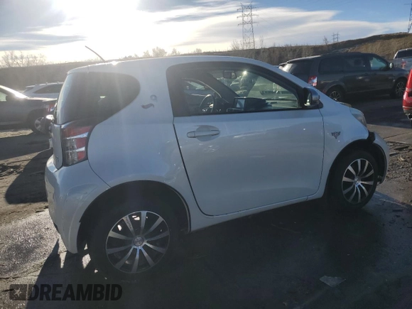2014 Scion iQ with VIN JTNJJXB01EJ026837, listed as a Copart auction lot 43596385 with 52,826 mi miles and Salvage title. Bid and sale history available at DreamBid. Image 3.