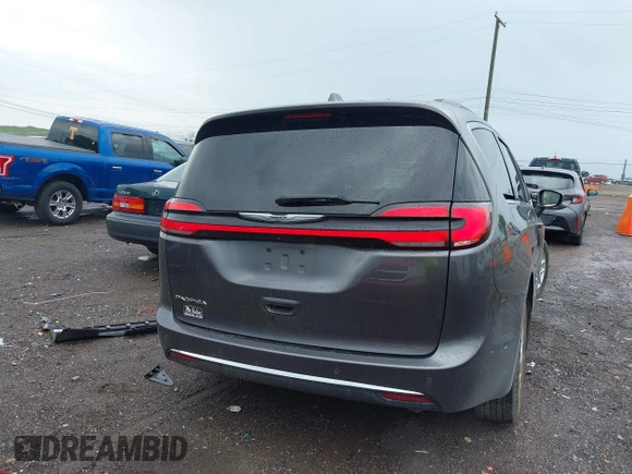 2022 Chrysler Pacifica Touring L with VIN 2C4RC1BG8NR116770, listed as a IAAI auction lot 42093616 with 98,479 mi miles and . Bid and sale history available at DreamBid. Image 16.