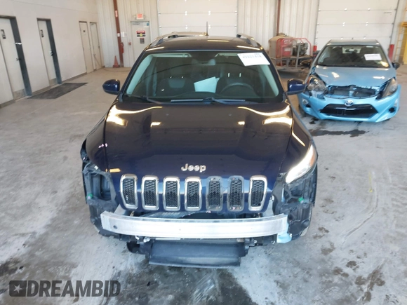 2014 Jeep Cherokee Latitude z VIN 1C4PJMCS2EW219949, wystawiony jako IAAI lot #42221418 z przebiegiem 74 961 mil mil oraz . Historia ofert i sprzedaży dostępna na DreamBid. Obrazek 12.