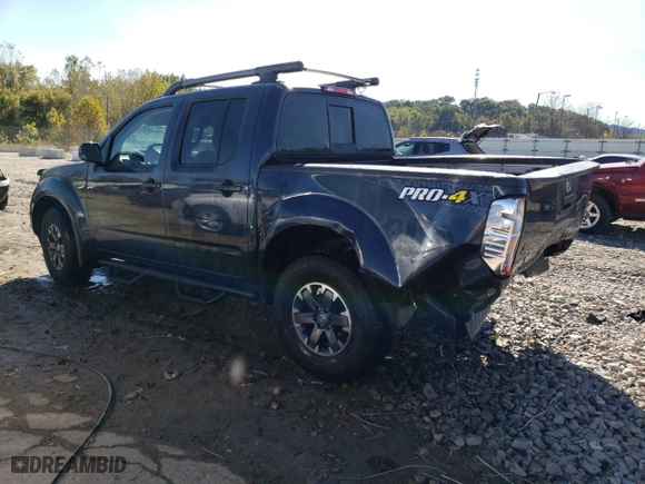 2020 Nissan Frontier PRO-4X with VIN 1N6ED0EB7LN715186, listed as a Copart auction lot 76899324 with NaN miles and Salvage Title. Bid and sale history available at carsss.com. Image 2.