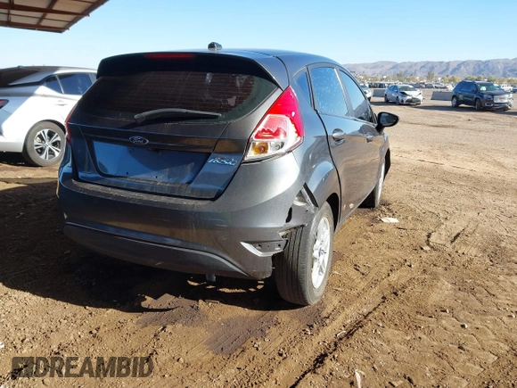 2019 Ford Fiesta SE with VIN 3FADP4EJ8KM101816, listed as a IAAI auction lot 41615459 with 71,028 mi miles. Bid and sale history available at carsss.com. Image 4.