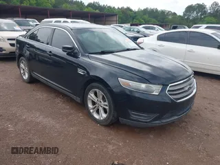 2014 Ford Taurus SEL with VIN 1FAHP2E83EG125068, listed as a IAAI auction lot 42101295 with 244,063 mi miles. Bid and sale history available at carsss.com. Image 1.