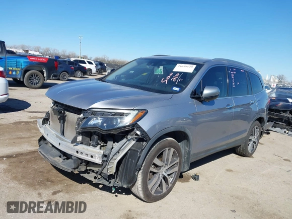 2017 Honda Pilot Touring with VIN 5FNYF5H93HB008088, listed as a IAAI auction lot 41699129 with 110,830 mi miles. Bid and sale history available at carsss.com. Image 17.