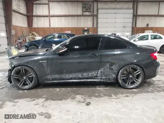 2018 BMW M2 with VIN WBS1J5C56JVD36919, listed as a IAAI auction lot 41587121 with 46,356 mi miles. Bid and sale history available at carsss.com. Image 14.