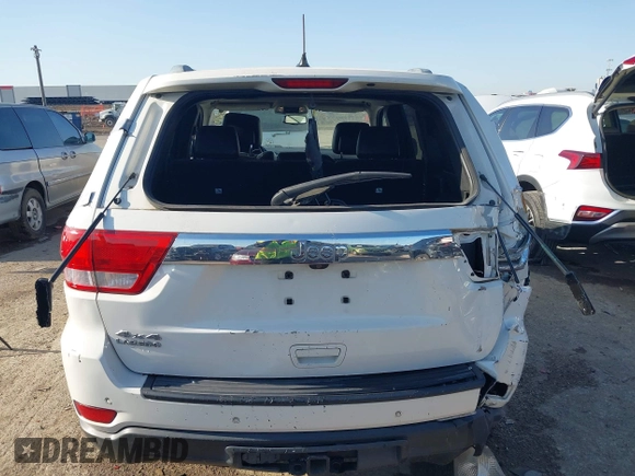 2011 Jeep Grand Cherokee Laredo with VIN 1J4RR4GG4BC703071, listed as a IAAI auction lot 41992878 with 126,199 mi miles and . Bid and sale history available at DreamBid. Image 16.