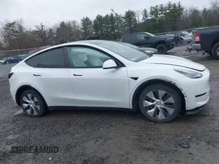 2020 Tesla Model Y Long Range with VIN 5YJYGDEE4LF044843, listed as a IAAI auction lot 41799504 with 40,770 mi miles and . Bid and sale history available at DreamBid. Image 13.