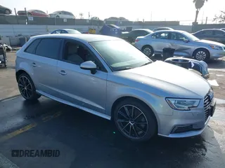 2017 Audi A3 e-tron Sportback Premium z VIN WAUUPBFF0HA104768, wystawiony jako IAAI lot #41155862 z przebiegiem 103 809 mil mil oraz . Historia ofert i sprzedaży dostępna na DreamBid. Obrazek 1.