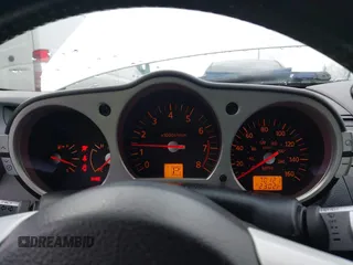 2004 Nissan 350Z Touring with VIN JN1AZ34E64T061197, listed as a IAAI auction lot 41917013 with 70,121 mi miles. Bid and sale history available at carsss.com. Image 7.