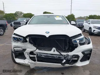 2021 BMW X6 xDrive40i with VIN 5UXCY6C00M9F88215, listed as a IAAI auction lot 41646498 with 43,587 mi miles. Bid and sale history available at carsss.com. Image 6.