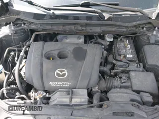 2016 Mazda CX-5 Grand Touring z VIN JM3KE2DY2G0765444, wystawiony jako IAAI lot #42527577 z przebiegiem 162 871 mil mil oraz . Historia ofert i sprzedaży dostępna na DreamBid. Obrazek 10.