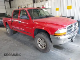2001 Dodge Dakota Sport with VIN 1B7HG2AN91S326020, listed as a IAAI auction lot 42701466 with 204,030 mi miles and . Bid and sale history available at DreamBid. Image 1.