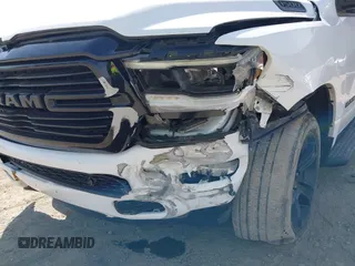 2021 Ram 1500 Big Horn with VIN 1C6SRFFT0MN521027, listed as a IAAI auction lot 41830596 with 55,013 mi miles and . Bid and sale history available at DreamBid. Image 6.