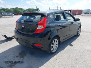 2014 Hyundai Accent SE z VIN KMHCU5AE6EU165345, wystawiony jako IAAI lot #42308781 z przebiegiem 98 216 mil mil oraz . Historia ofert i sprzedaży dostępna na DreamBid. Obrazek 4.