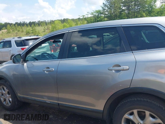2015 Mazda CX-9 Touring with VIN JM3TB2CA2F0451180, listed as a IAAI auction lot 42180078 with 112,804 mi miles and . Bid and sale history available at carsss.com. Image 14.