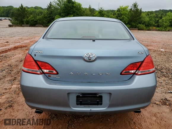 2005 Toyota Avalon XL z VIN 4T1BK36B65U041287, wystawiony jako Copart lot #56566535 z przebiegiem 223 562 mil mil oraz Szkoda całkowita • Salvage title. Historia ofert i sprzedaży dostępna na DreamBid. Obrazek 6.