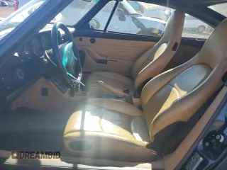 1996 Porsche 911 with VIN WP0DA2996TS385231, listed as a Copart auction lot 83699964 with 60,492 mi miles and Salvage title. Bid and sale history available at DreamBid. Image 7.