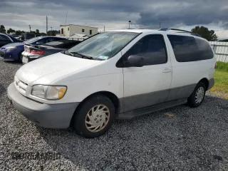 2000 Toyota Sienna CE with VIN 4T3GF19C0YU294779, listed as a Copart auction lot 74715024 with 164,664 mi miles and Salvage Title. Bid and sale history available at carsss.com. Image 1.