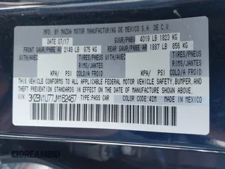 2018 Mazda 3 Sport with VIN 3MZBN1U77JM162467, listed as a IAAI auction lot 41821629 with 98,782 mi miles and . Bid and sale history available at DreamBid. Image 9.