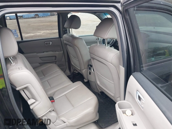 2012 Honda Pilot EX-L with VIN 5FNYF4H57CB068021, listed as a IAAI auction lot 41909996 with 253,542 mi miles and . Bid and sale history available at carsss.com. Image 8.