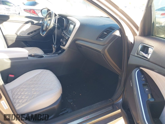 2014 Kia Optima SXL Turbo with VIN 5XXGR4A65EG327515, listed as a IAAI auction lot 41876799 with 115,533 mi miles and . Bid and sale history available at DreamBid. Image 5.
