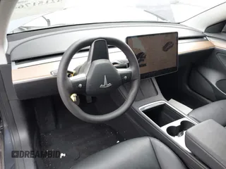 2023 Tesla Model 3 z VIN 5YJ3E1EAXPF403095, wystawiony jako IAAI lot #42151764 z przebiegiem 17 872 mil mil oraz . Historia ofert i sprzedaży dostępna na DreamBid. Obrazek 22.
