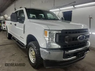 2021 Ford Super Duty F-250 SRW XL with VIN 1FT7W2BT0MEC12003, listed as a IAAI auction lot 42015454 with 100,895 mi miles. Bid and sale history available at carsss.com. Image 1.