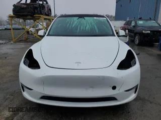 2023 Tesla Model Y Long Range z VIN 7SAYGDEE7PA102174, wystawiony jako Copart lot #49904435 z przebiegiem 144 702 mil mil oraz Szkoda całkowita • Salvage title. Historia ofert i sprzedaży dostępna na DreamBid. Obrazek 5.