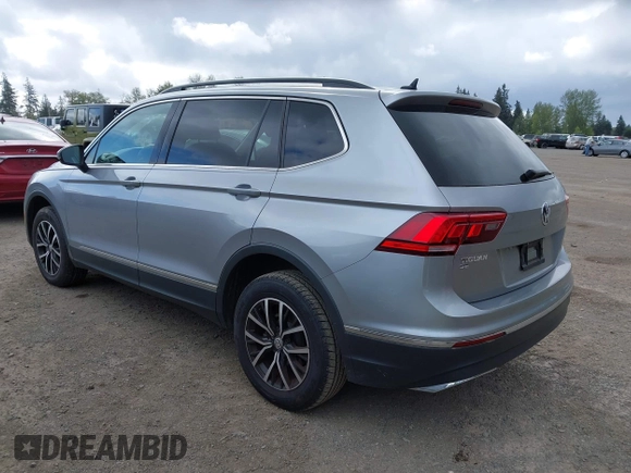 2021 Volkswagen Tiguan SE with VIN 3VV3B7AX0MM008809, listed as a IAAI auction lot 42077986 with 70,780 mi miles and . Bid and sale history available at DreamBid. Image 3.