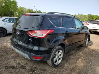2014 Ford Escape SE with VIN 1FMCU9GX2EUB50177, listed as a Copart auction lot 58579645 with 228,017 mi miles and Salvage title. Bid and sale history available at DreamBid. Image 3.