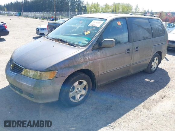 2000 Honda Odyssey EX with VIN 2HKRL1863YH008265, listed as a IAAI auction lot 42041096 with 157,694 mi miles and . Bid and sale history available at DreamBid. Image 2.