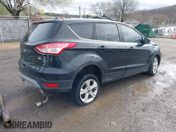 2013 Ford Escape SE with VIN 1FMCU9GX9DUD34661, listed as a IAAI auction lot 41945565 with 239,752 mi miles and . Bid and sale history available at DreamBid. Image 4.