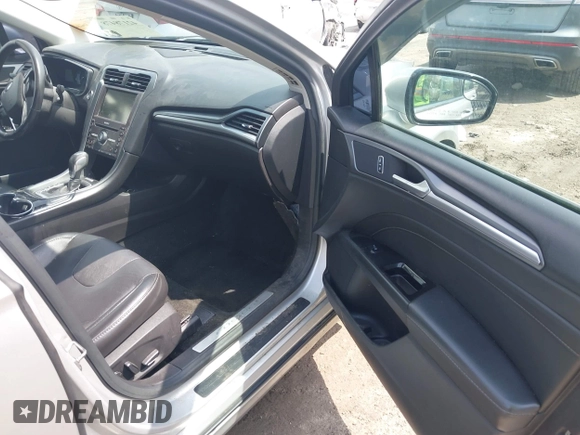 2016 Ford Fusion Titanium with VIN 3FA6P0K93GR223280, listed as a IAAI auction lot 42178478 with 189,239 mi miles and . Bid and sale history available at DreamBid. Image 5.