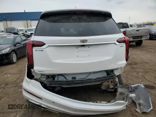 2024 Cadillac XT6 AWD Premium Luxury with VIN 1GYKPDRS0RZ759007, listed as a Copart auction lot 44117035 with 10,037 mi miles and Salvage title. Bid and sale history available at DreamBid. Image 6.