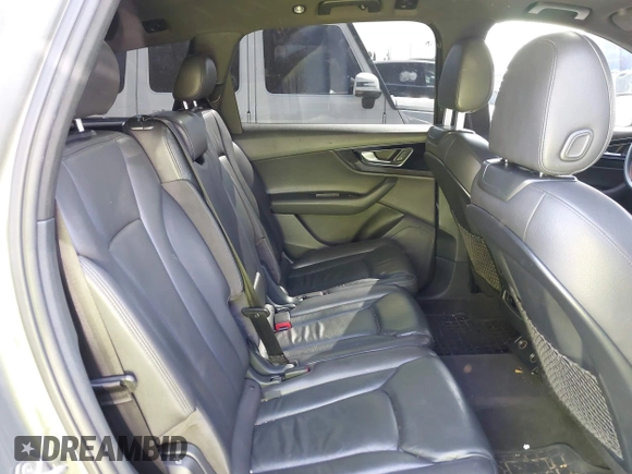 2017 Audi Q7 Premium with VIN WA1AAAF71HD010675, listed as a IAAI auction lot 41956959 with 136,549 mi miles and . Bid and sale history available at DreamBid. Image 8.