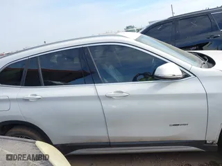 2018 BMW X1 sDrive28i with VIN WBXHU7C32J5H41587, listed as a IAAI auction lot 41538394 with 125,804 mi miles. Bid and sale history available at carsss.com. Image 14.