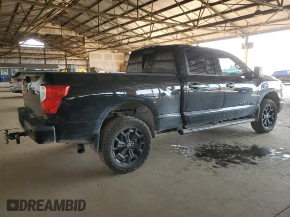 2019 Nissan Titan XD SL with VIN 1N6BA1F47KN534864, listed as a Copart auction lot 65651974 with 79,230 mi miles and Salvage Title. Bid and sale history available at carsss.com. Image 3.