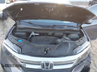 2019 Honda Pilot EX-L z VIN 5FNYF5H5XKB026513, wystawiony jako IAAI lot #41269623 z przebiegiem 62 372 mil mil oraz . Historia ofert i sprzedaży dostępna na DreamBid. Obrazek 10.