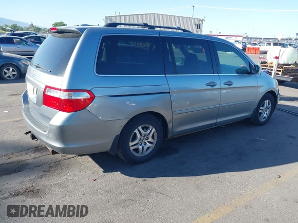 2006 Honda Odyssey EX-L z VIN 5FNRL38766B102432, wystawiony jako IAAI lot #42356315 z przebiegiem 214 261 mil mil oraz . Historia ofert i sprzedaży dostępna na DreamBid. Obrazek 4.