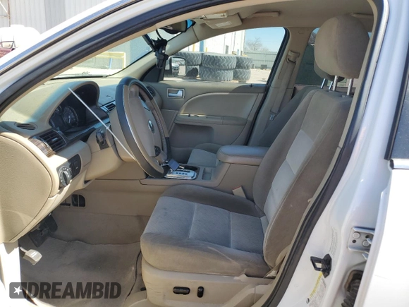 2005 Mercury Montego Luxury z VIN 1MEFM40155G626347, wystawiony jako Copart lot #46715235 z przebiegiem 213 883 mil mil oraz Szkoda całkowita • Salvage title. Historia ofert i sprzedaży dostępna na DreamBid. Obrazek 7.