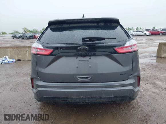 2023 Ford Edge SE z VIN 2FMPK4G95PBA41278, wystawiony jako IAAI lot #41964995 z przebiegiem 21 079 mil mil oraz . Historia ofert i sprzedaży dostępna na DreamBid. Obrazek 16.