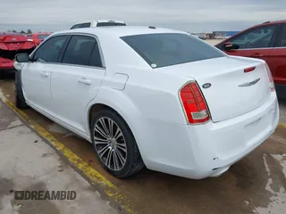 2013 Chrysler 300 with VIN 2C3CCABGXDH735739, listed as a IAAI auction lot 41282492 with 121,487 mi miles. Bid and sale history available at carsss.com. Image 3.