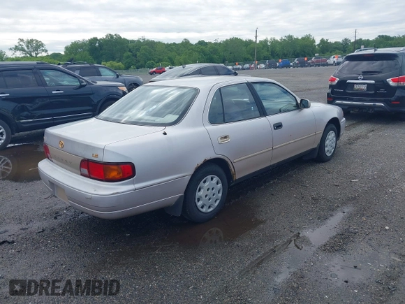 1996 Toyota Camry DX z VIN 4T1BG12K8TU754331, wystawiony jako IAAI lot #42305723 z przebiegiem 152 709 mil mil oraz . Historia ofert i sprzedaży dostępna na DreamBid. Obrazek 4.
