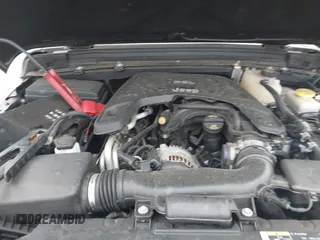 2019 Jeep Wrangler Unlimited Sport Altitude with VIN 1C4HJXDG0KW559807, listed as a IAAI auction lot 41790082 with 34,221 mi miles and . Bid and sale history available at DreamBid. Image 10.