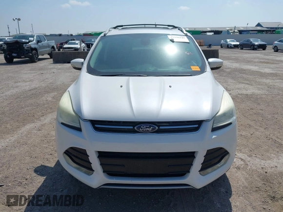 2015 Ford Escape Titanium with VIN 1FMCU0JX4FUB07322, listed as a IAAI auction lot 42220345 with 184,852 mi miles and . Bid and sale history available at DreamBid. Image 12.