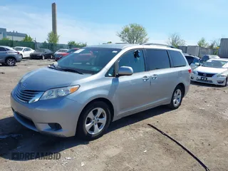 2015 Toyota Sienna LE AAS with VIN 5TDKK3DC5FS642583, listed as a IAAI auction lot 42110445 with 61,668 mi miles. Bid and sale history available at carsss.com. Image 2.