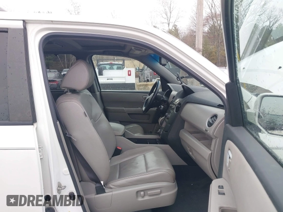 2013 Honda Pilot Touring with VIN 5FNYF4H95DB011661, listed as a IAAI auction lot 42101104 with 298,004 mi miles and . Bid and sale history available at carsss.com. Image 5.