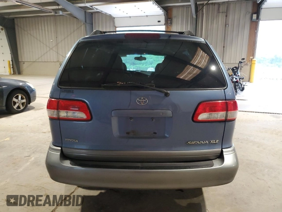 2002 Toyota Sienna LE with VIN 4T3ZF13C42U437712, listed as a Copart auction lot 64836245 with 151,693 mi miles and Salvage title. Bid and sale history available at DreamBid. Image 6.
