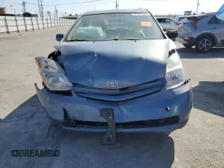 2005 Toyota Prius z VIN JTDKB20U457028965, wystawiony jako Copart lot #57987625 z przebiegiem Nie podano mil oraz Szkoda całkowita • Salvage title. Historia ofert i sprzedaży dostępna na DreamBid. Obrazek 5.