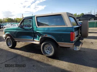 1996 Ford Bronco Custom with VIN 1FMEU15H4TLB59116, listed as a Copart auction lot 52989015 with 210,464 mi miles and Salvage title. Bid and sale history available at DreamBid. Image 2.