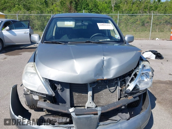 2012 Nissan Versa S with VIN 3N1BC1CP2CK279126, listed as a IAAI auction lot 42002414 with 193,567 mi miles. Bid and sale history available at carsss.com. Image 12.